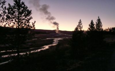 Old Faithful before sunrise